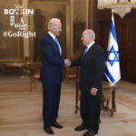 Joe Biden shaking hands with Benjamin Netanyahu